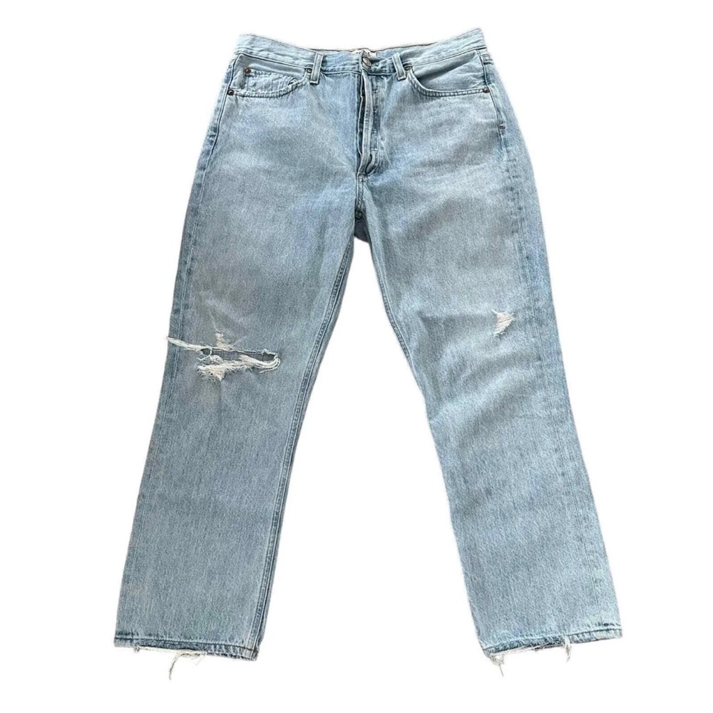 Light wash Riley Agolde high rise distressed jeans. 23” waist. Vintage style